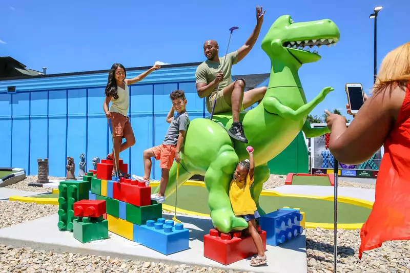 family on giant dino